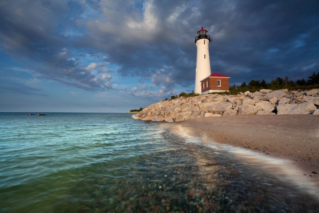 crisp point lighthouse at sunset